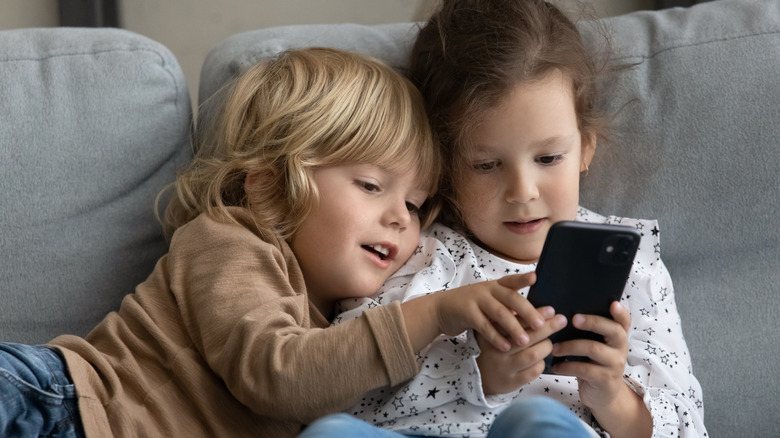 Children use smartphone at home