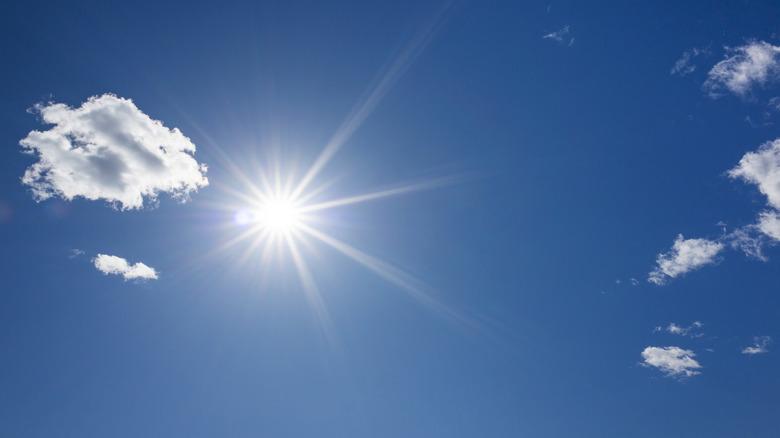 sky with clouds and sun