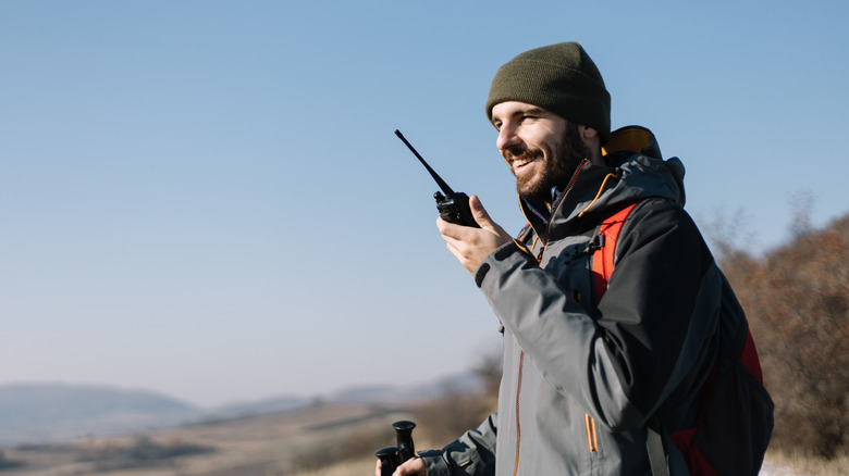 man using walkie talkie