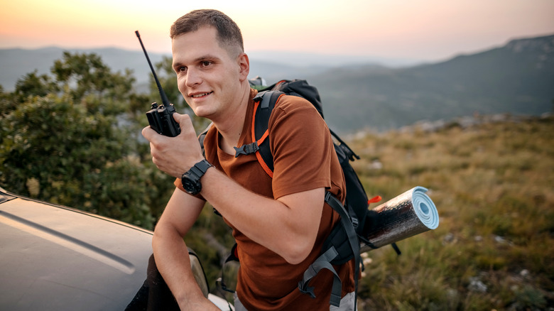 man using walkie talkie