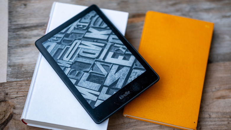 Woman using digital device with a text-filled screen