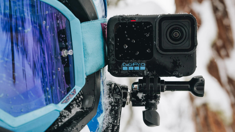 GoPro and GoPro Helmet Front + Side Mount attached to helmet in snow