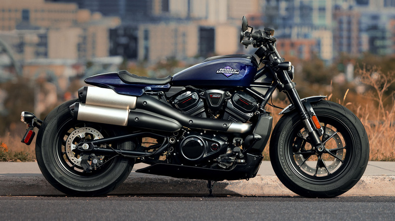 Blue Harley-Davidson Sportster standing roadside