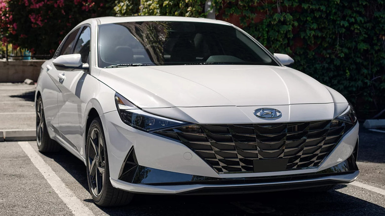 White 2023 Hyundai Elantra Hybrid parked