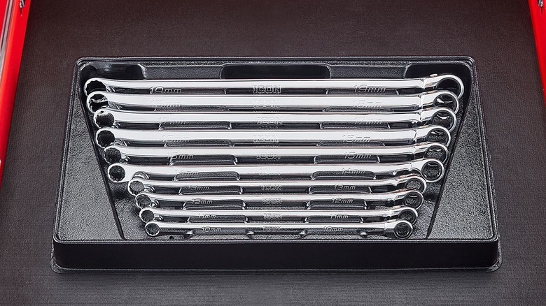 Ratchet wrenches stacked in a case