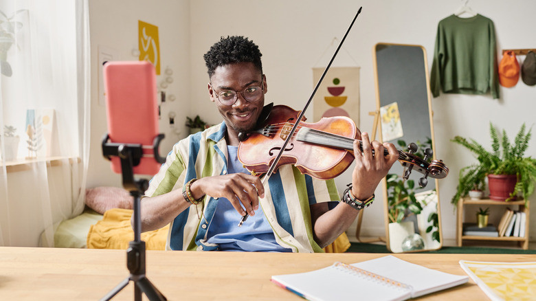 man playing violin