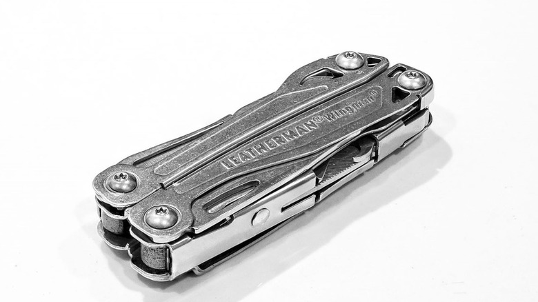 leatherman multi tool on white background