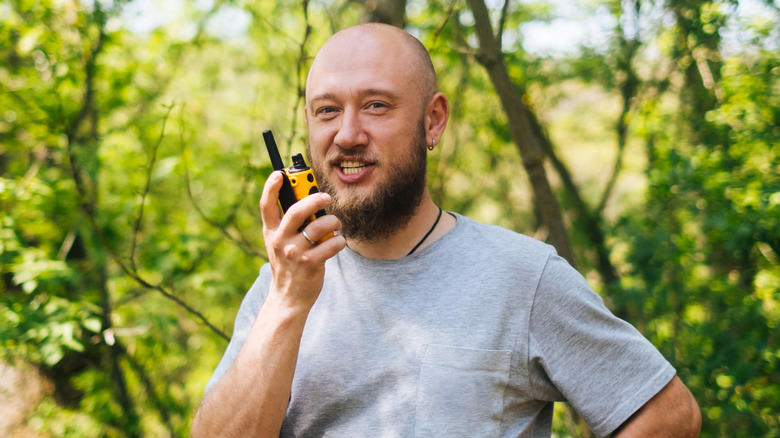 Man holding walkie-talkie