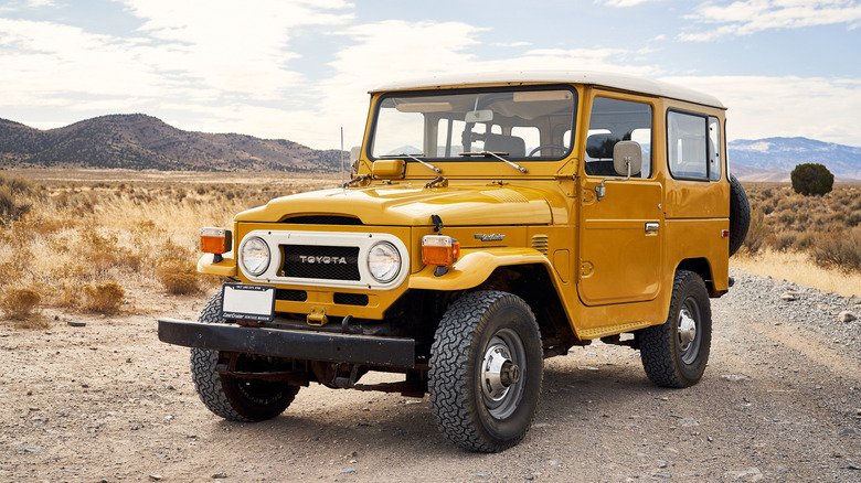 Yellow Toyota Land Cruiser FJ40 front 3/4 view