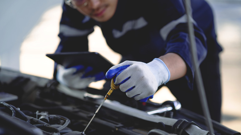 Mechanic working on car