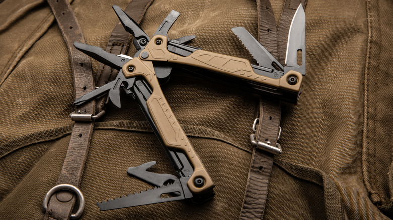 multitool atop camping gear