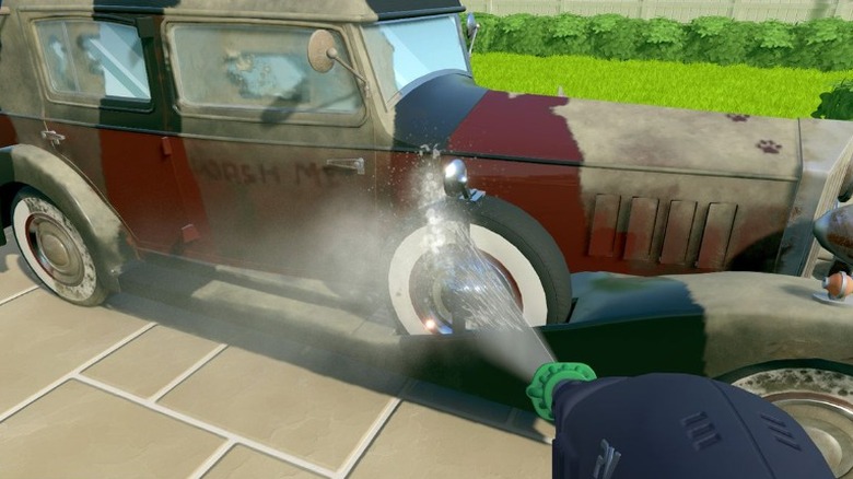 Power washing a car with water