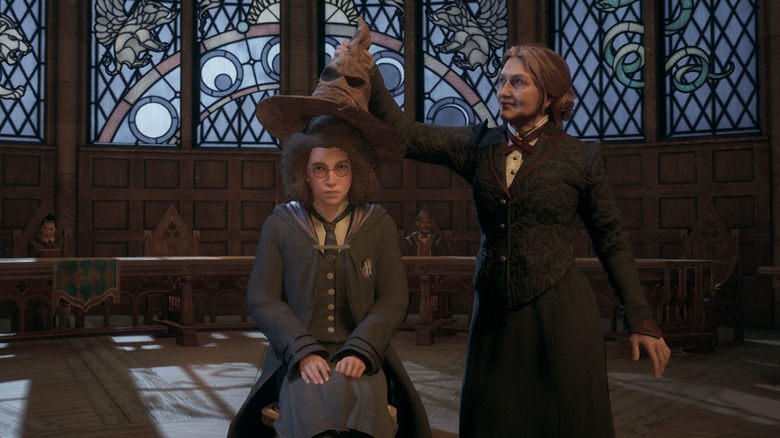 Sorting hat being placed on student