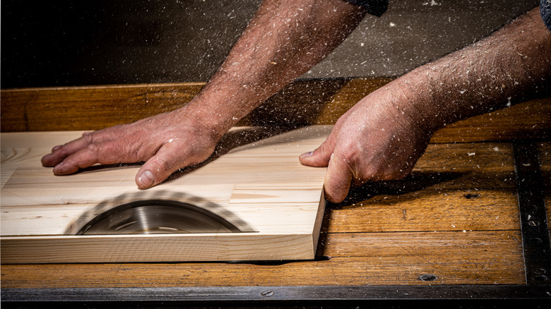 wood being cut table saw