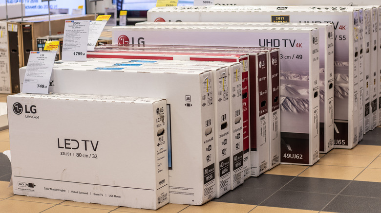 TV boxes stacked at a store