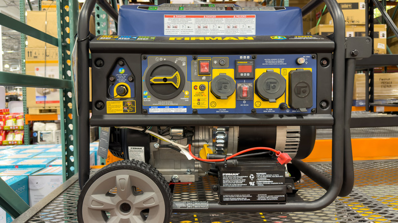A portable generator on a rack in a warehouse store