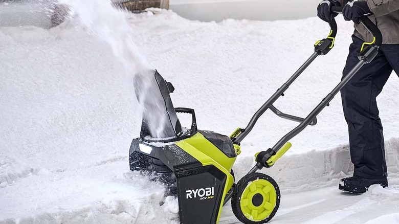 Man using snow  blower