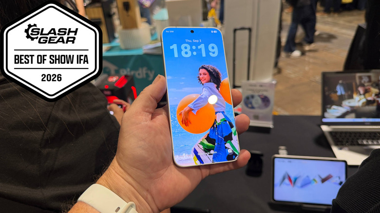 Hand holding the Tecno concept phone