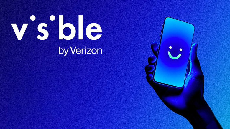 Someone holding a phone with the Visible by Verizon logo