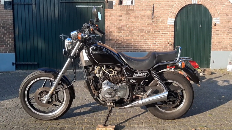 Ducati Indian parked on brick driveway