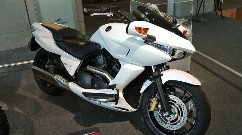 White Honda DN-01 motorcycle on display