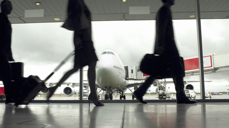 Travelers airport walking