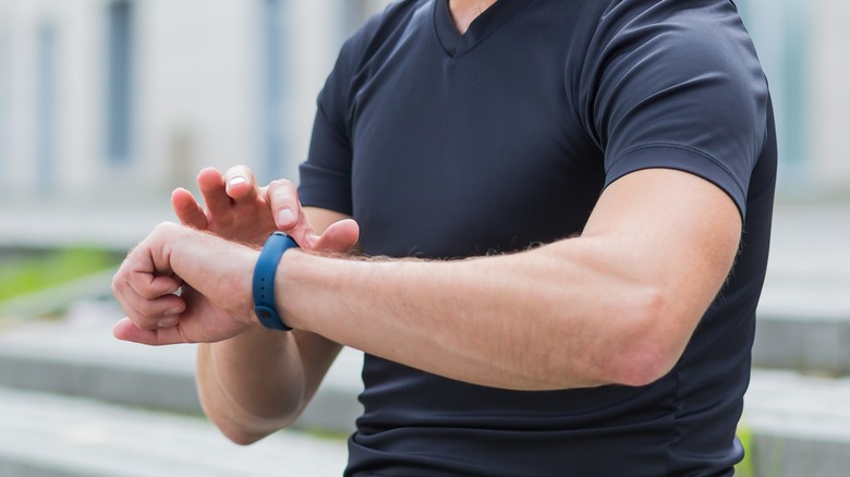 Man looking at watch