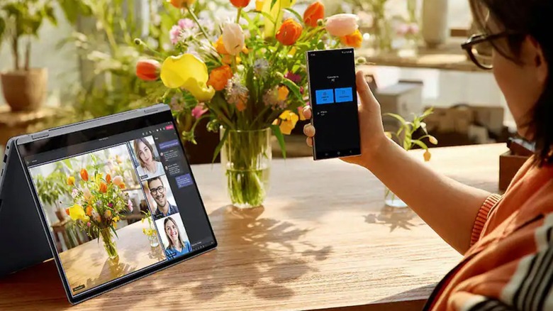 Samsung 16-inch Galaxy Book4 Pro 360 paired with Galaxy phone during video call