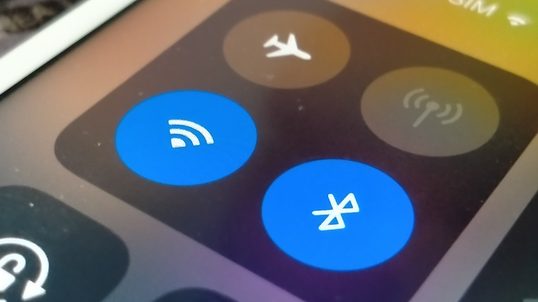 Wi-Fi and Bluetooth logos in an iPhone quick setting screen