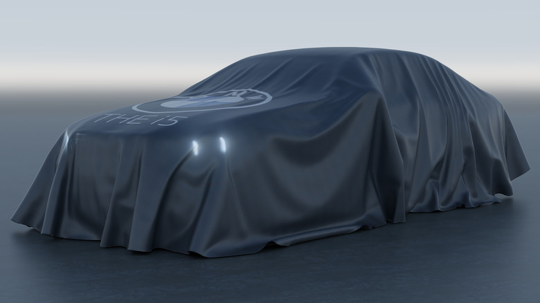 BMW i5 EV car cover teaser
