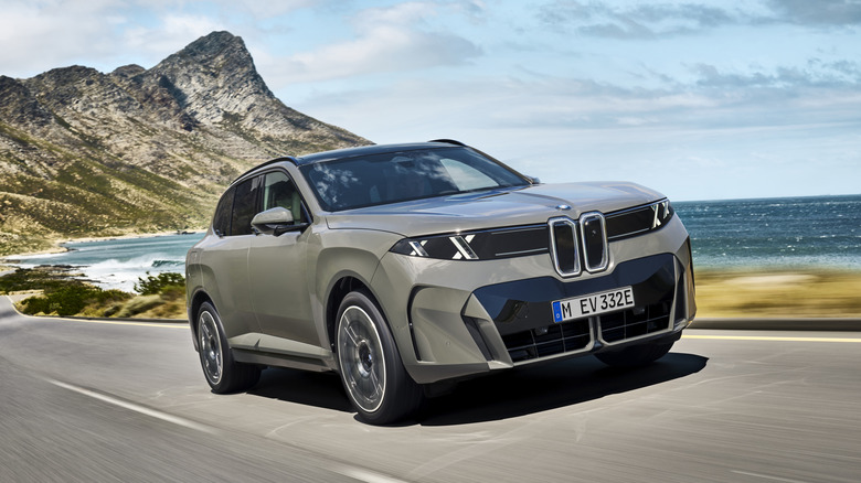 2027 BMW iX5 60 xDrive driving.