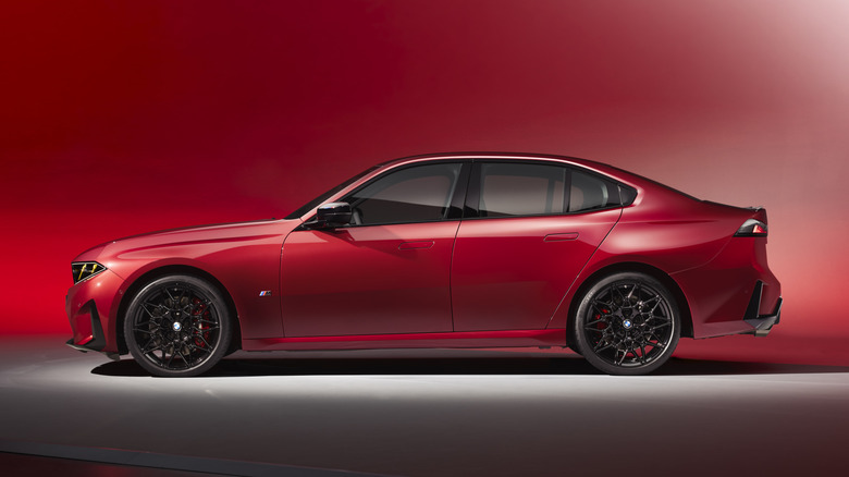 Red 2027 BMW 3 Series profile view