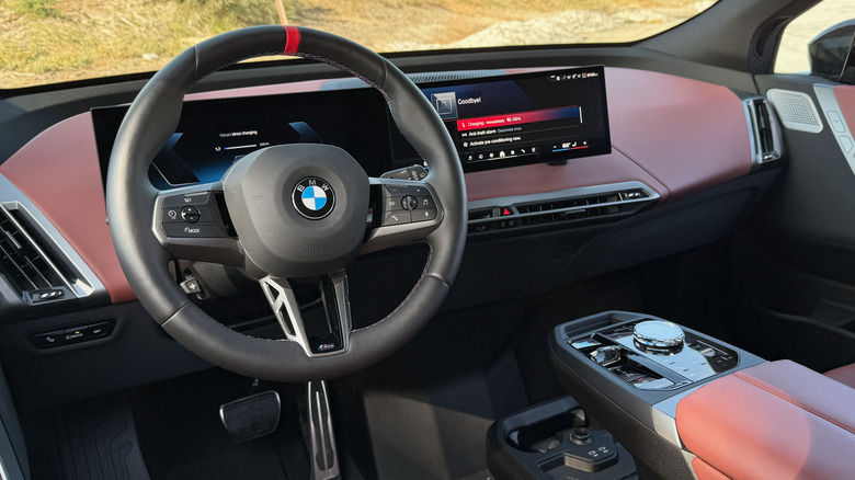 2026 BMW iX M70 steering wheel and dashboard