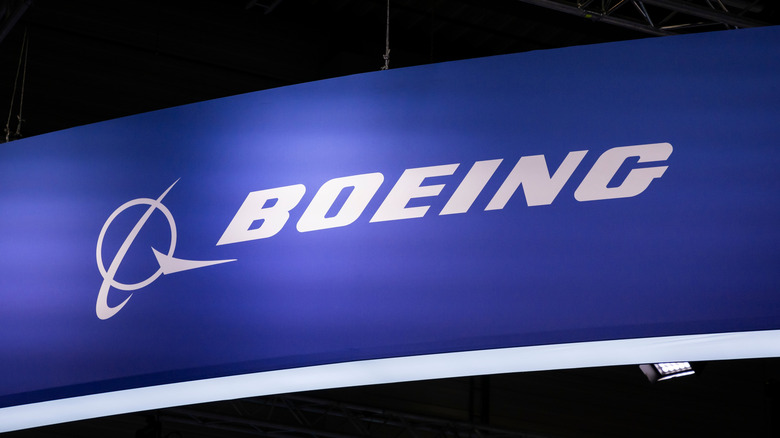 Boeing logo on a banner at an industry fair
