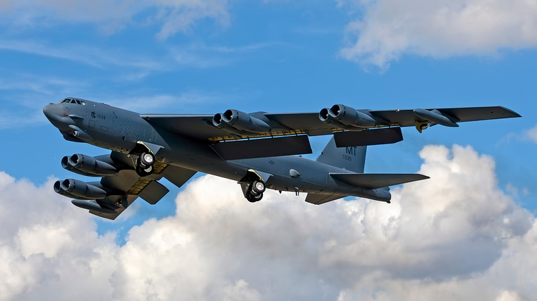 B-52H Stratofortress taking off against a cloudy sky
