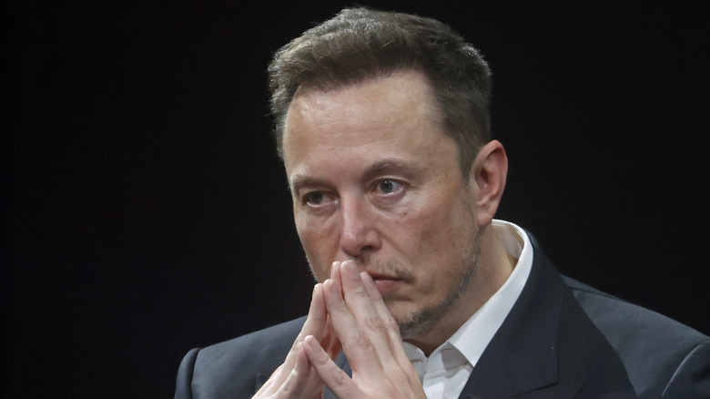 A worried Elon Musk 