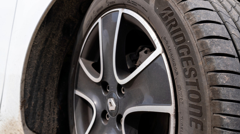 A closeup of a Bridgestone car tire on a Renault