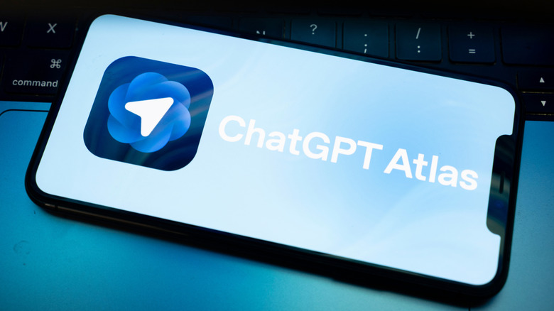 Smartphone with ChatGPT Atlas browser opening