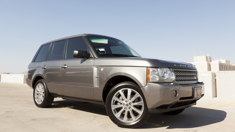 A silver Range Rover SUV.
