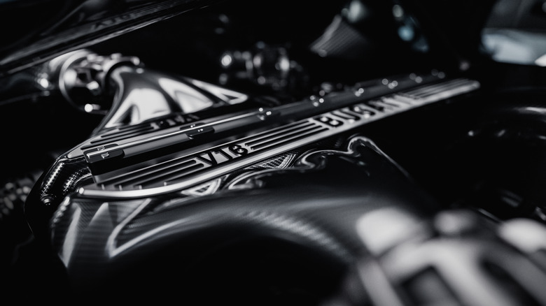 Bugatti Tourbillon V16 engine close-up of intake cover, with focus on "V16" text
