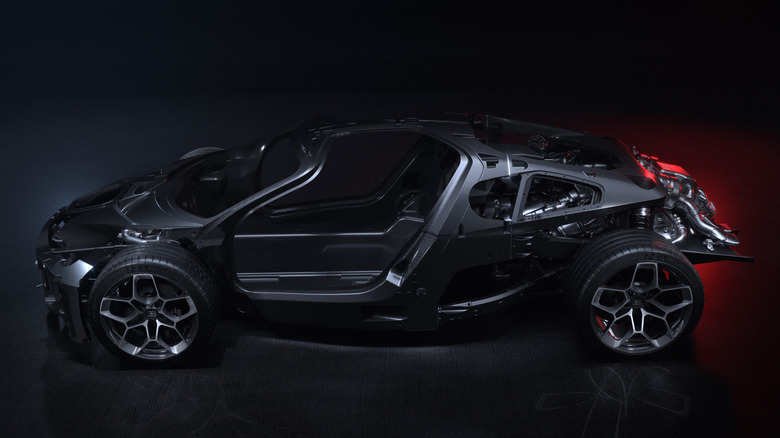 Bugatti Tourbillon cutaway chassis on black background, left-side view