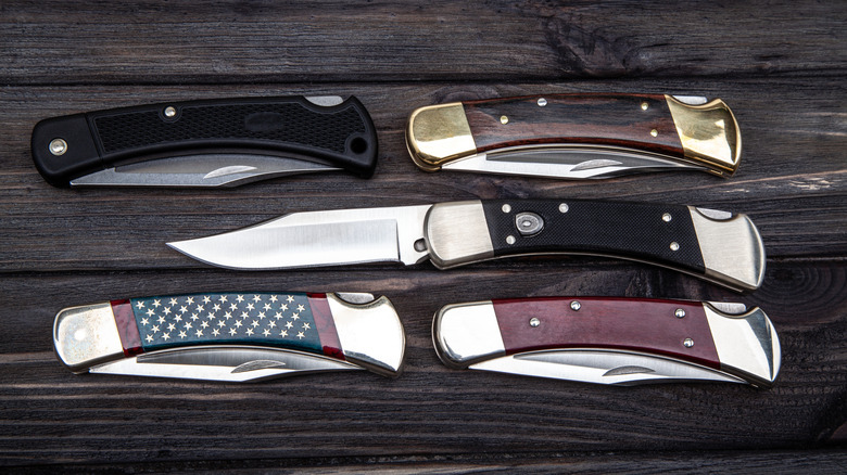 pocket knives on a table
