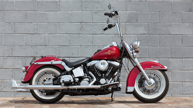 Harley Davidson Heritage Softail red color, during an exhibition of classic motorcycles in the streets of Bilbao.