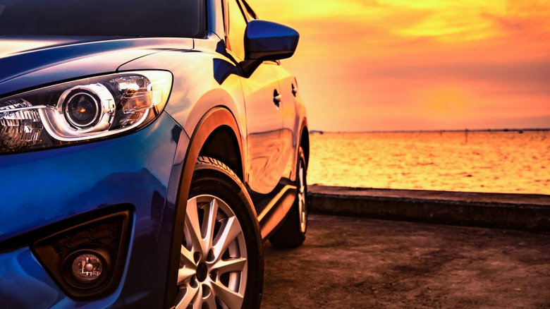 All electric vehicle in a sunset