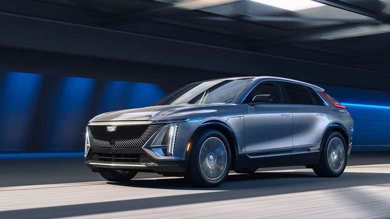 Front-quarter shot of a Cadillac driving in a tunnel