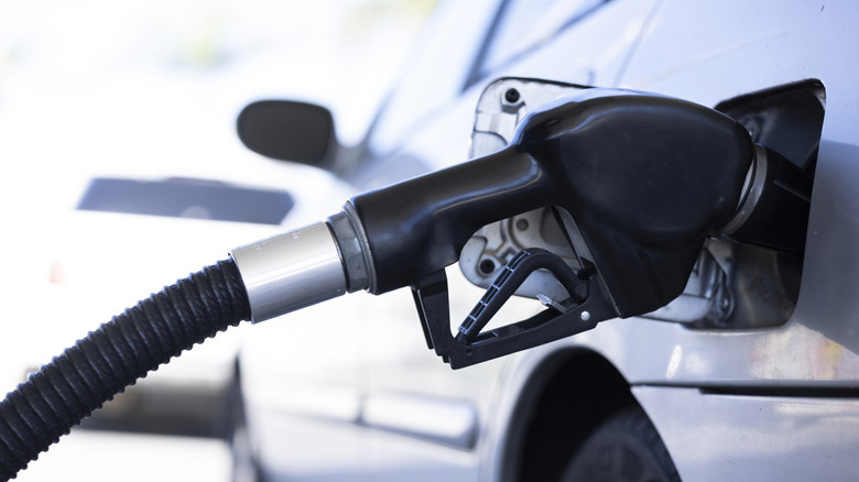 Car filling up at gas station