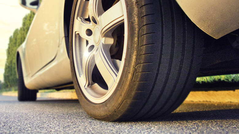 Close-up of a car's rear tire.