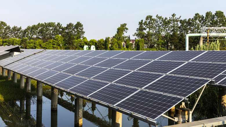 Solar panels installed over water