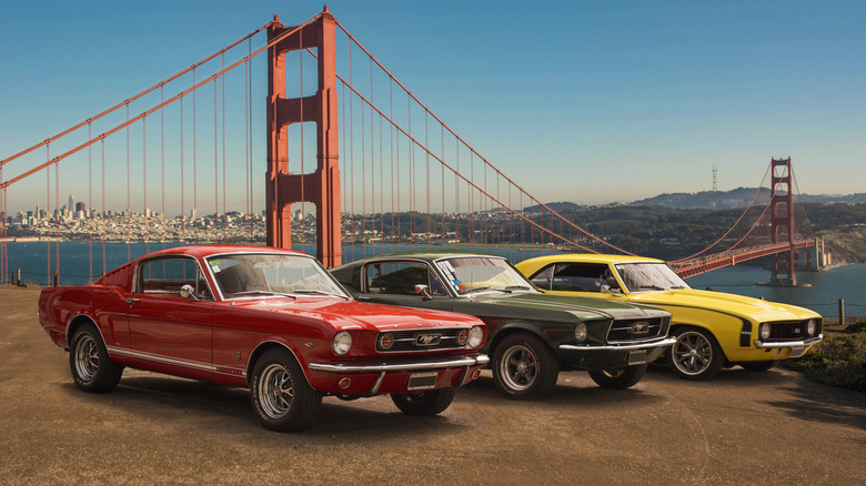 Two Mustangs and a Camaro