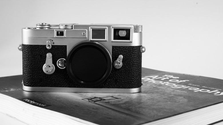 Leica M3 sitting on a book